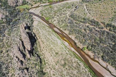 High angle view of road amidst rocks