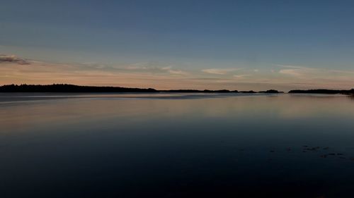 Scenic shot of calm sea at dusk