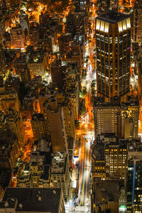 High angle view of illuminated cityscape at night