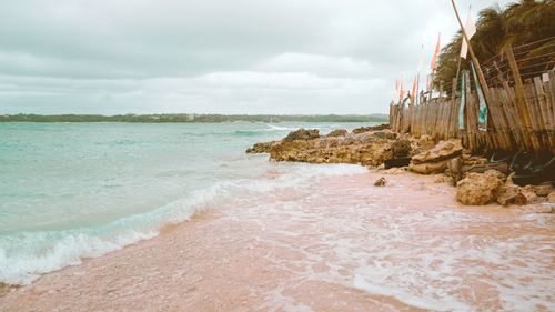 Scenic view of beach against sky