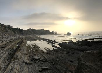 Scenic view of sea against sky during sunset