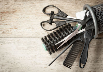 Directly above shot of hairdresser equipment on table