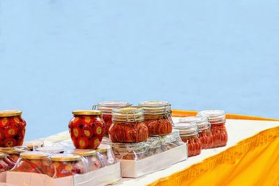 Close-up of bottles against white background