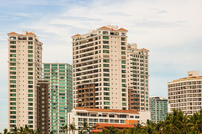 Low angle view of buildings against sky