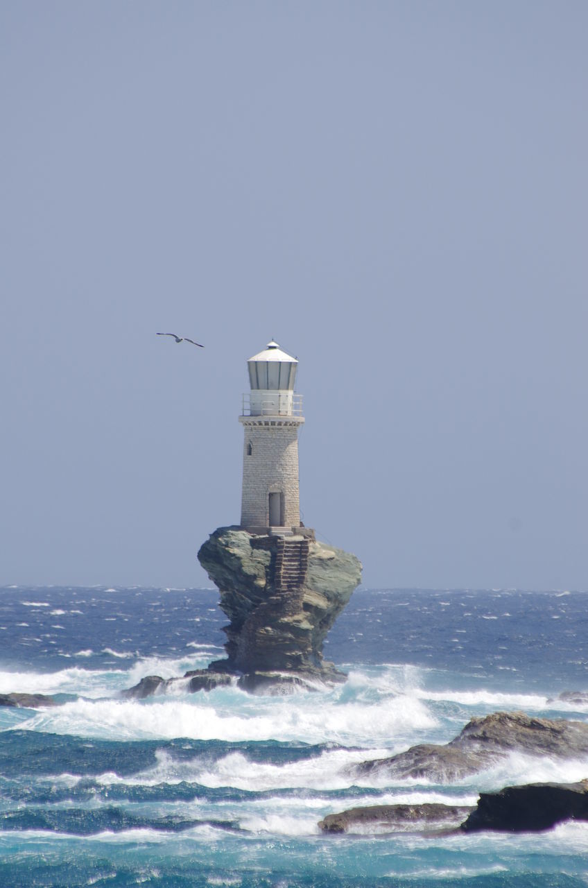 VIEW OF LIGHTHOUSE AT SEA AGAINST CLEAR SKY