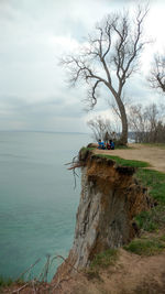 Scenic view of landscape against cloudy sky