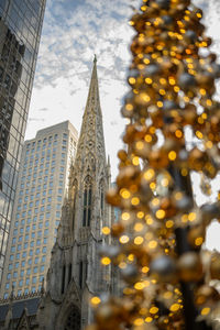 Low angle view of skyscrapers against sky