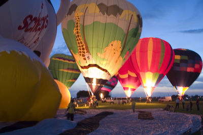 View of hot air balloons at sunset