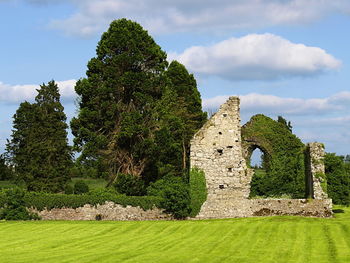 View of stone structure against cloudy sky