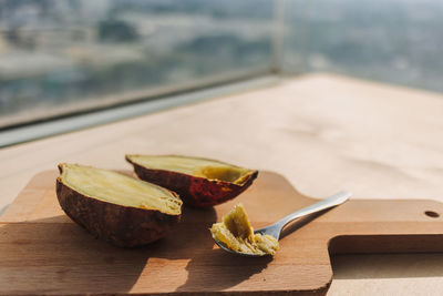 High angle view of fruits on cutting board