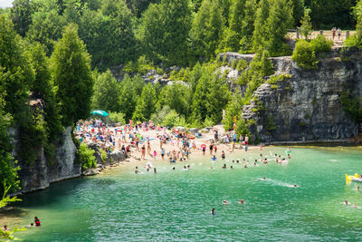 People enjoying in water.