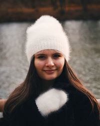 Portrait of a smiling young woman in winter