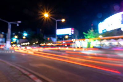 Light trails on city street at night