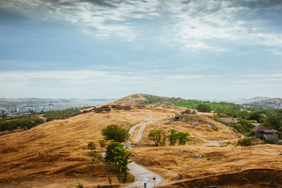 High angle view of road amidst landscape against sky