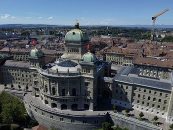 High angle view of buildings in city against sky