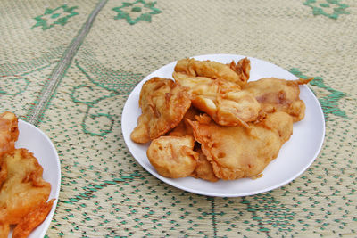 High angle view of bread in plate on table