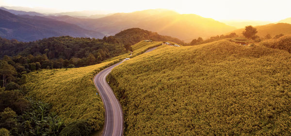 Scenic view of landscape against sky during sunset