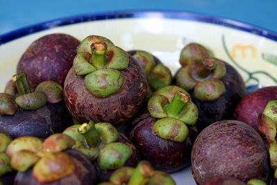 Close-up of fruits in plate on table