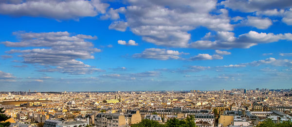 High angle shot of townscape against sky