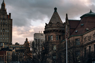 Buildings in city against sky