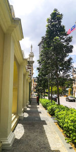 Street amidst buildings against sky