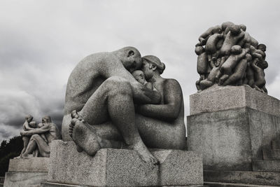 Low angle view of statue against sky