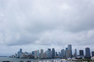 Modern buildings in city against sky