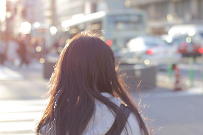 Rear view of woman on street