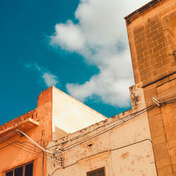 Low angle view of old building against sky