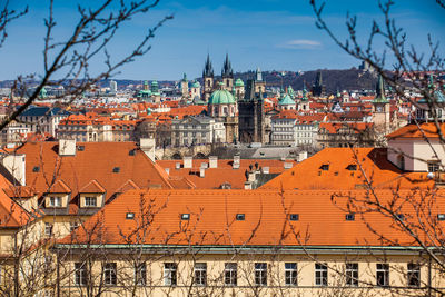 Charles bridge and prague city old town seen from petrin hill in a beautiful early spring day