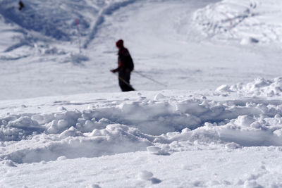 Person skiing on snow covered land