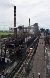 High angle view of factory against sky