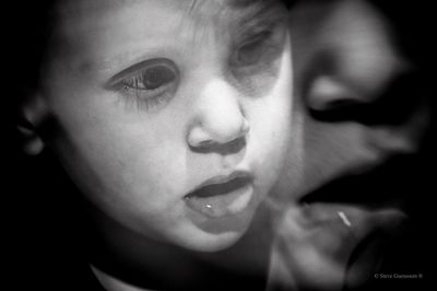 Close-up portrait of boy looking away