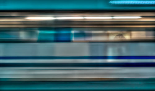 Blurred motion of train at subway station