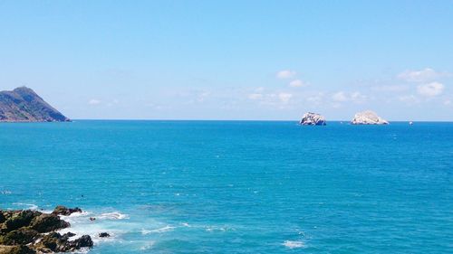 Scenic view of calm sea against sky