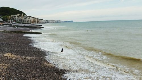 Scenic view of beach against sky