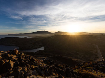 Scenic view of mountains against sky during sunset