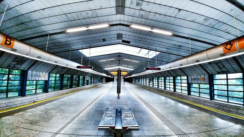 Interior of illuminated railroad station