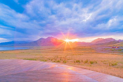 Scenic view of landscape against sky during sunset