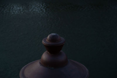 High angle view of bottle on black background