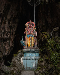 Statue in temple against building