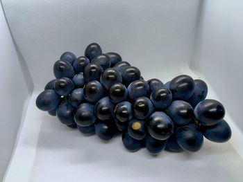 High angle view of grapes on table