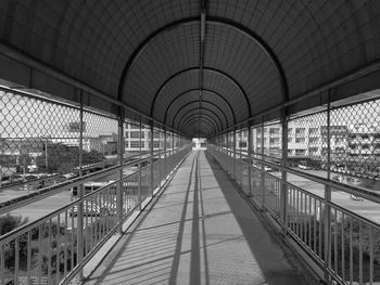 Empty footbridge in city