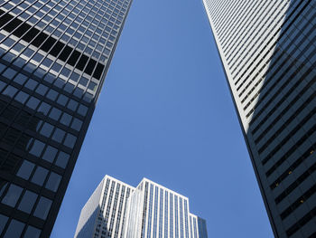 Low angle view of modern building against clear sky