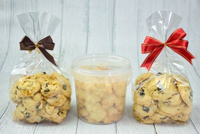 Close-up of cookies in glass jar on table