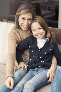 Portrait of mother and daughter