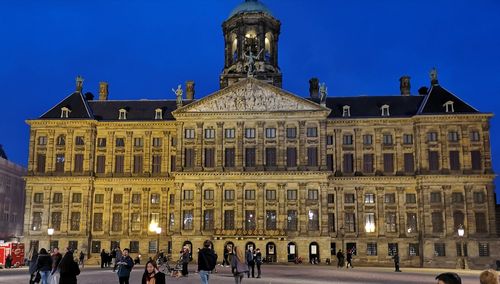 Group of people in front of building