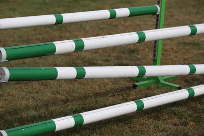 Close-up of pipes on field