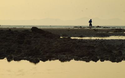 Scenic view of sea against clear sky