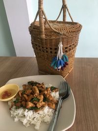 High angle view of food in basket on table